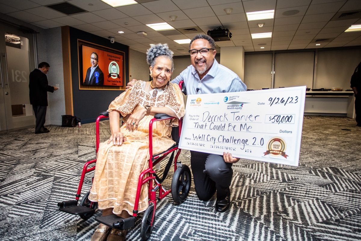 Derrick Tarver accepting the Well City Challenge grand prize